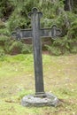 Cross at old beautiful semetery in Finland