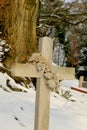 Cross ornament in the snow Royalty Free Stock Photo