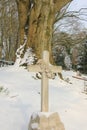 Cross ornament in the snow Royalty Free Stock Photo