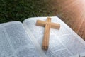 The cross is placed on the open Bible. A prayer asks for the blessing of Jesus. God believes in the divine power of God through Royalty Free Stock Photo