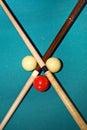 Cross with pool sticks