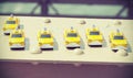 Cross processed instagram photo of taxi toys on Brooklyn Bridge. Royalty Free Stock Photo