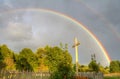 Cross and rainbow after rain