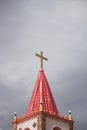 Cross and god rays on the cloudy sky Royalty Free Stock Photo