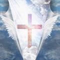 Cross revealed by angels wings