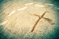 Cross in sand Royalty Free Stock Photo