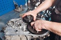 Cross-section of a car gearbox. mechanics work in the garage. hand mechanic in working clothes Royalty Free Stock Photo