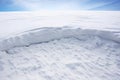 cross-section of compacted, layered snow