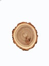 Cross-section of a cut tree trunk with a wavy pattern of annual rings Royalty Free Stock Photo