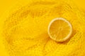 Cross section lemon yellow slice background close-up net netting packing package Royalty Free Stock Photo