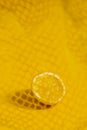 Cross section lemon yellow slice background close-up net netting packing package Royalty Free Stock Photo