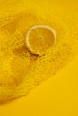 Cross section lemon yellow slice background close-up net netting packing package Royalty Free Stock Photo