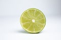 Cross-section of lime fruit isolated on a white background Royalty Free Stock Photo