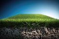 Cross section of a perfect lawn, soil mixed with sand and vibrant green perfectly trimmed grass Royalty Free Stock Photo