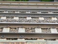 A cross section of railroad tracks on cement ties Royalty Free Stock Photo