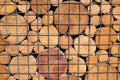 Pattern from the ends of wooden beams of circular cross-section. Royalty Free Stock Photo