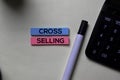 Cross-Selling text on sticky notes isolated on office desk