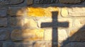 Cross shadow projected on a stone wall Royalty Free Stock Photo