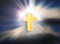 Cross on a sky with dramatic light, clouds, sunbeams. Easter. Royalty Free Stock Photo