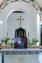 Cross standing on the central altar in the Beatitude Monastery located on the mountain on the coast of the Sea of Galilee - Kinner