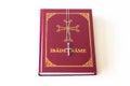 A Cross Stands On A Turkish Orthodox Prayer Book
