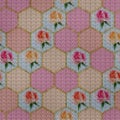 Cross-stitch. Embroidery. Hexagon seamless texture. Grid. Mosaic. Geometric openwork. Pattern in multicolor hexagon. Modern