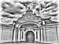 Christian orthodox cross on the church dome above the entrance gate and dramatic gray white sky and clouds Royalty Free Stock Photo