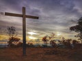 A cross on the top of the hill before the sunset fall. Royalty Free Stock Photo