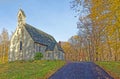 cross on top of historic little country church on top of a hill in Fall Royalty Free Stock Photo