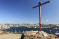 Cross at the top of Krestovaya hill and panorama of the Golden Horn bay and the city center Royalty Free Stock Photo