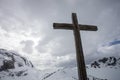 Cross on top of swiss mountain peak Royalty Free Stock Photo