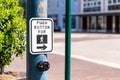 Cross walk sign for pedestrians to cross a downtown street Royalty Free Stock Photo