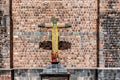Cross at the wall of Convent of Santo Domingo in Koricancha complex in the city of Cusco, Peru
