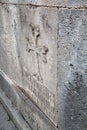 Cross on the wall of Geghard monastery Royalty Free Stock Photo