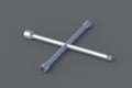 Cross wheel wrench on gray background