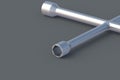 Cross wheel wrench on gray background