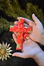 Cross wrapped in paper as a present for Christmas