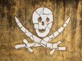 Crossbones known as the Jolly Roger on a mosaic wall