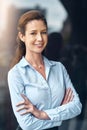 Crossed arms, business and portrait of happy woman in city for working, career and job. Professional workplace Royalty Free Stock Photo