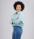 Crossed arms, happy and portrait of black woman in studio with pride, confidence and excited smile. Fashion, happiness Royalty Free Stock Photo