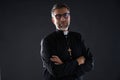 Crossed arms priest portrait senior Royalty Free Stock Photo