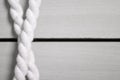 Crossed braided rope on wood Royalty Free Stock Photo