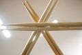 Crossed drumsticks. Bottom view. Hobbies and pastime. Royalty Free Stock Photo