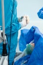 Crossed fingers of a surgeon in sterile gloves. Royalty Free Stock Photo