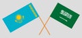 Crossed flags of Kazakhstan and the Kingdom of Saudi Arabia