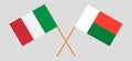 Crossed flags of Madagascar and Italy