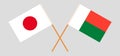 Crossed flags of Madagascar and Japan