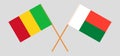 Crossed flags of Mali and Madagascar