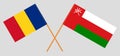 Crossed flags of Oman and Romania