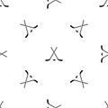 Crossed hockey sticks and puck pattern seamless black